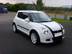 Click image for larger version

Name:	Exterior%20tuning%20on%20white%20Suzuki%20Swift%20with%20stripes%20.jpg
Views:	0
Size:	47.3 KB
ID:	3598